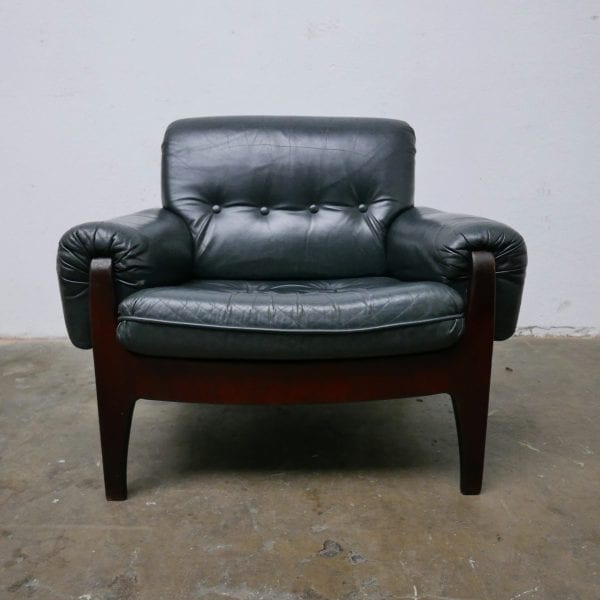 Donkergroen leren fauteuil