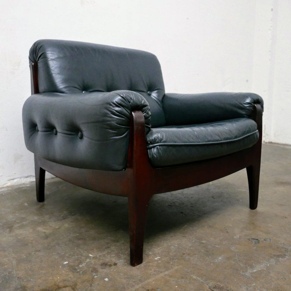 Donkergroen leren fauteuil
