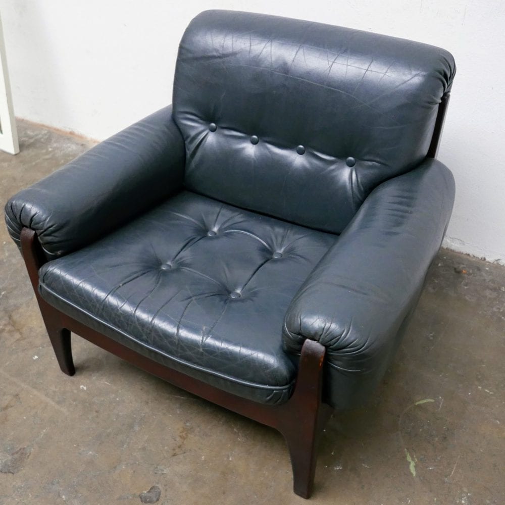 Donkergroen leren fauteuil