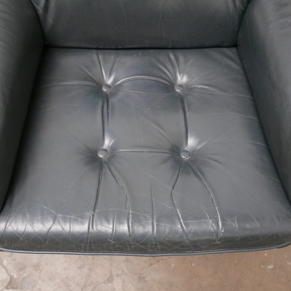 Donkergroen leren fauteuil