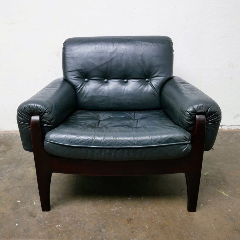 Donkergroen leren fauteuil