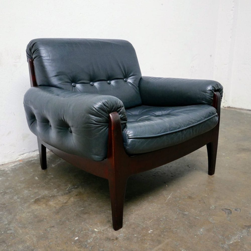 Donkergroen leren fauteuil