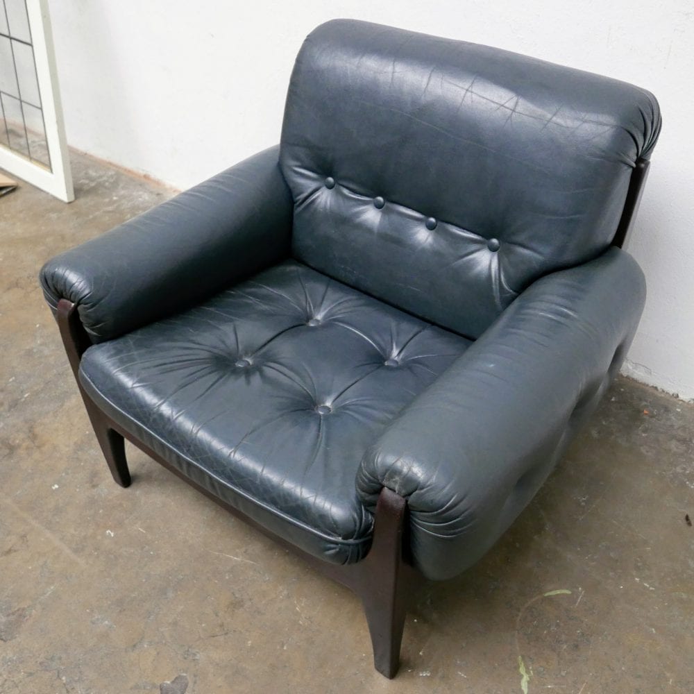 Donkergroen leren fauteuil
