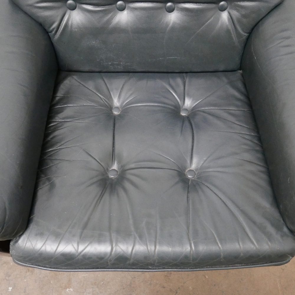 Donkergroen leren fauteuil