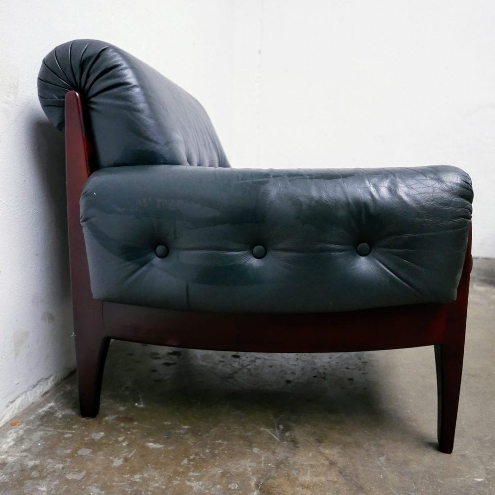 Donkergroen leren fauteuil