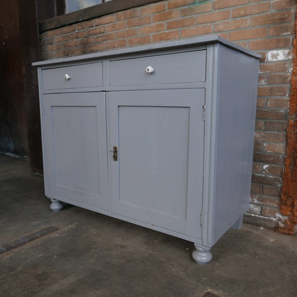 Grijze commode