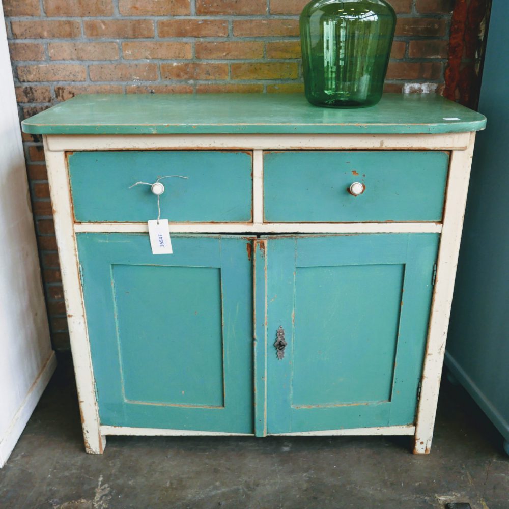 Crème-groene commode