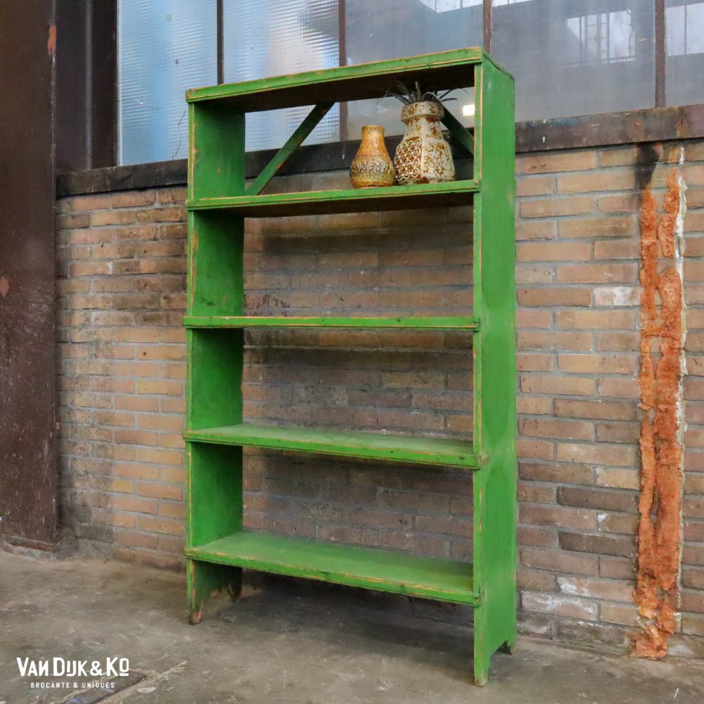 Groene boekenkast open kast