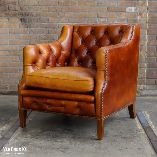 Antieke leren fauteuil