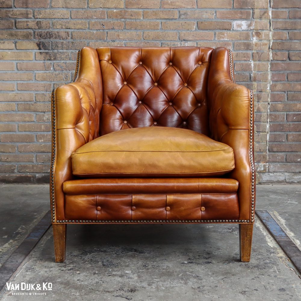 Antieke leren fauteuil