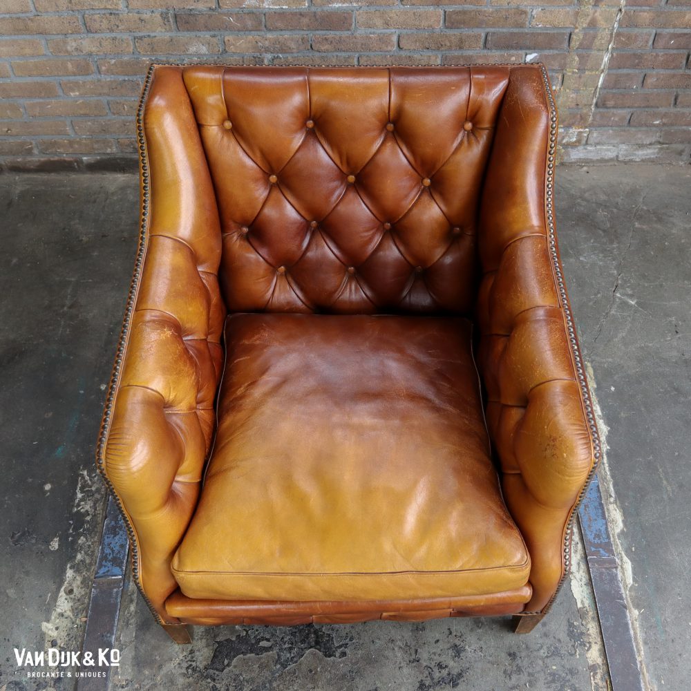 Antieke leren fauteuil