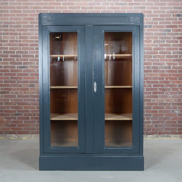 Blauwe vitrinekast